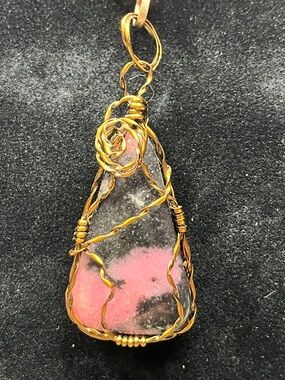 Wire wrapped pink opal pendant